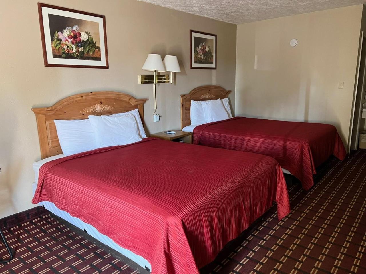 Economy Inn מק'קוק מראה חיצוני תמונה